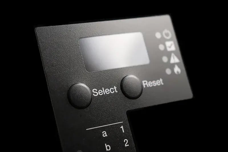 Embossed Buttons on Black Polycarbonate 