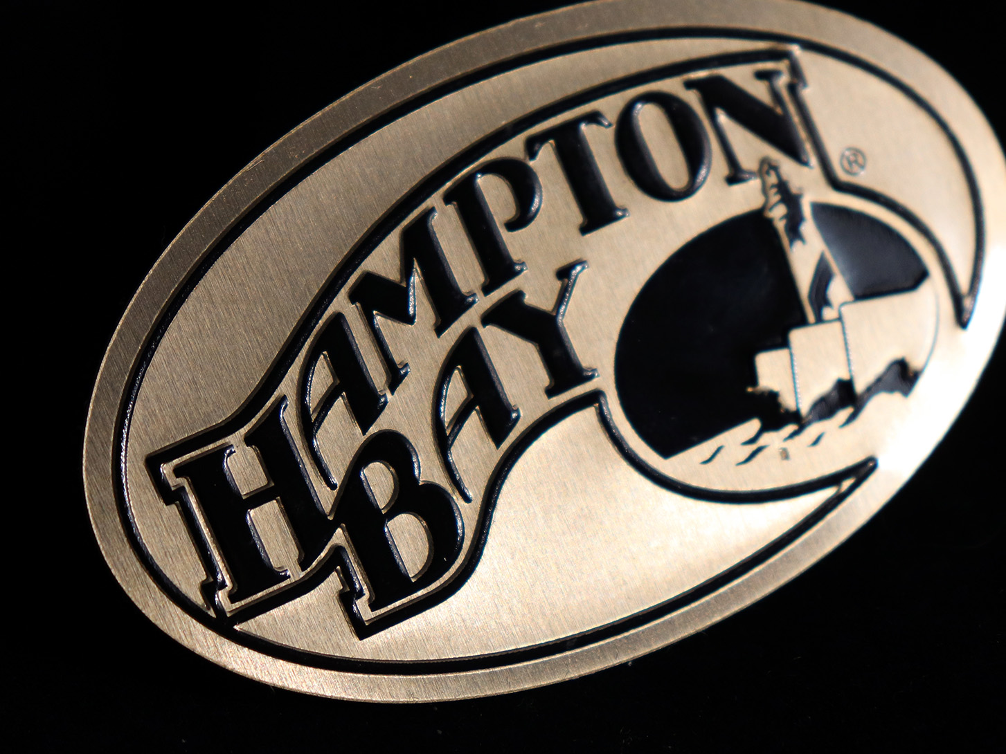 Metal Nameplate with a gold tint and embossing
