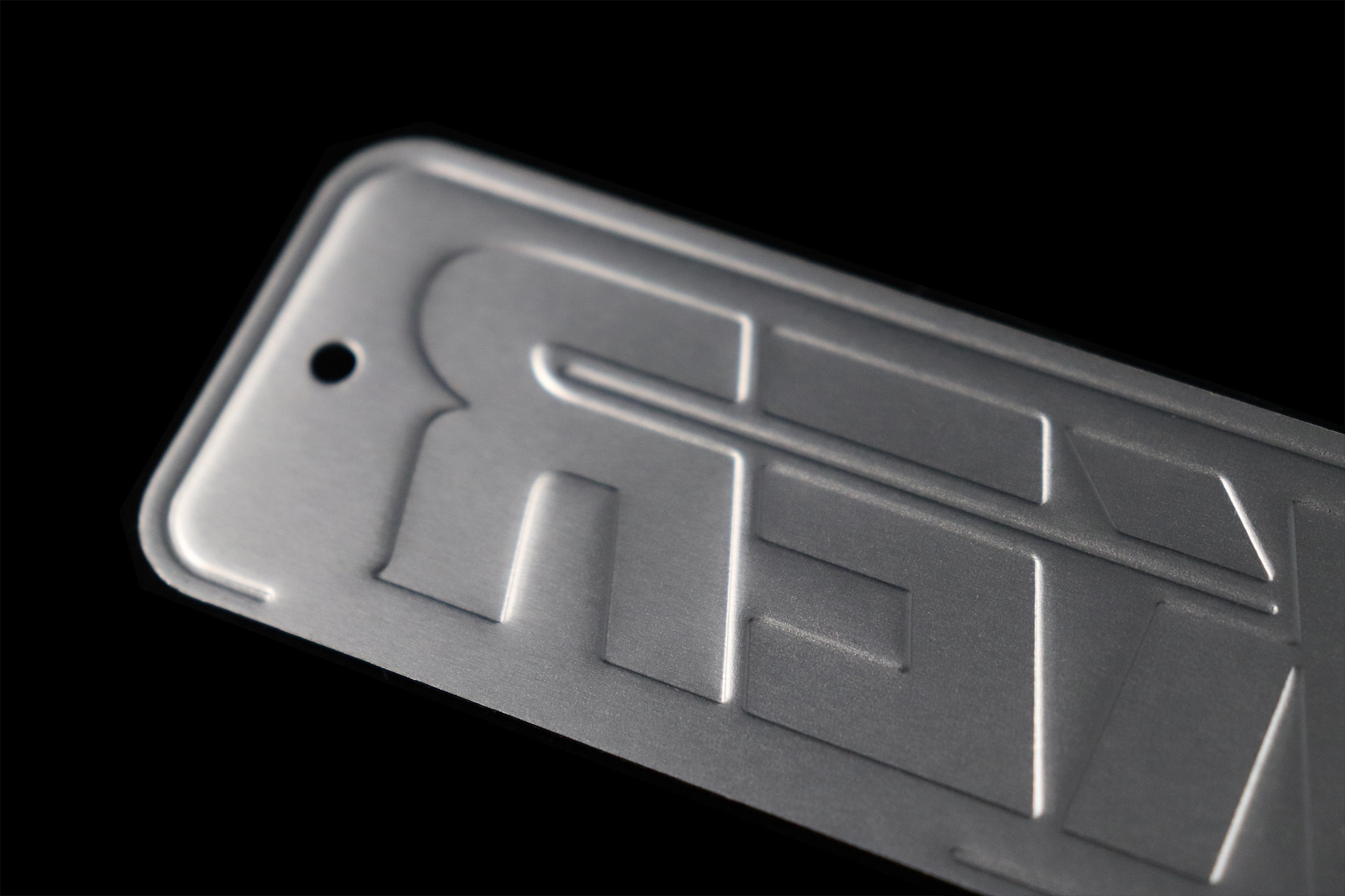 Metal Nameplate, High Heat Exposure, Embossed Metal Label, McLoone Metal Graphics
